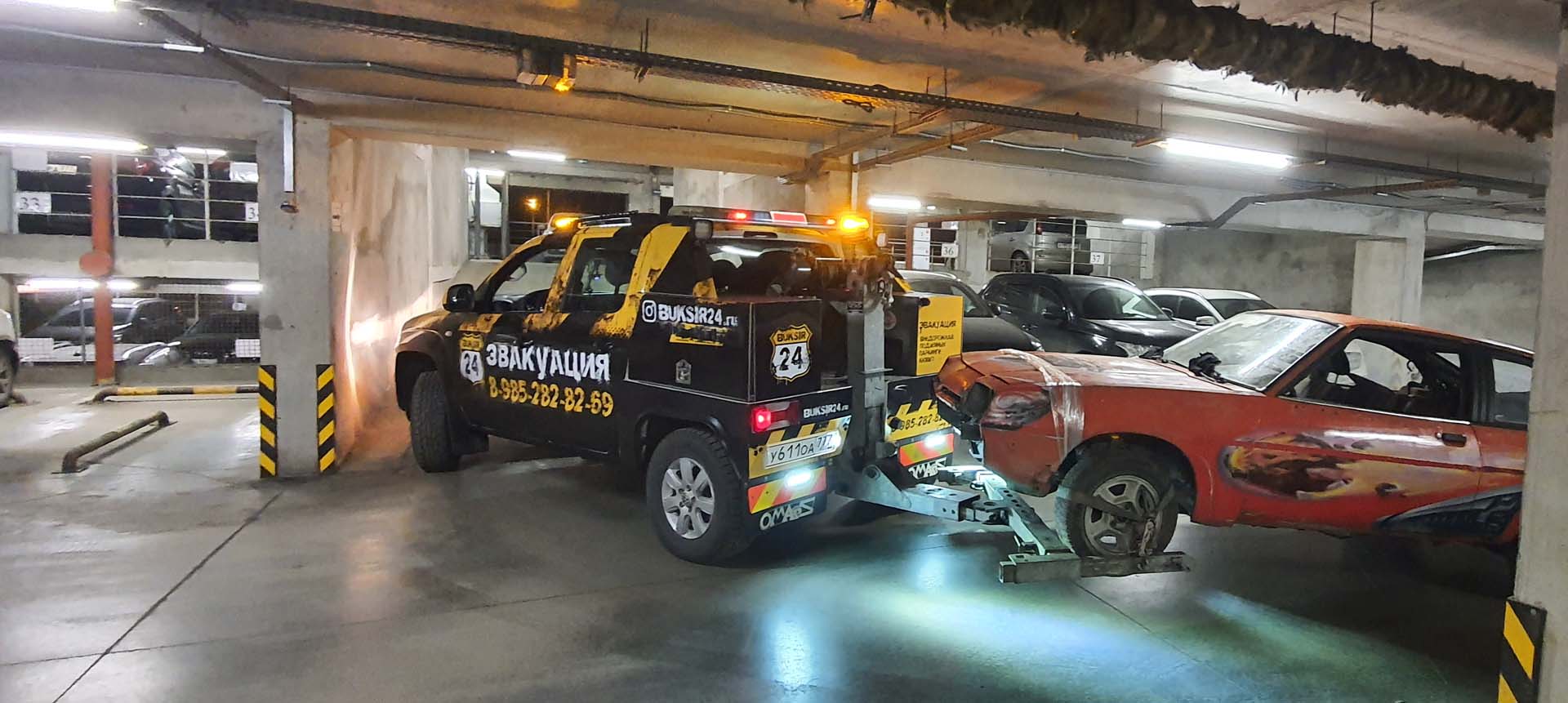 Помощь авто в подземном паркинге услугами эвакуатора